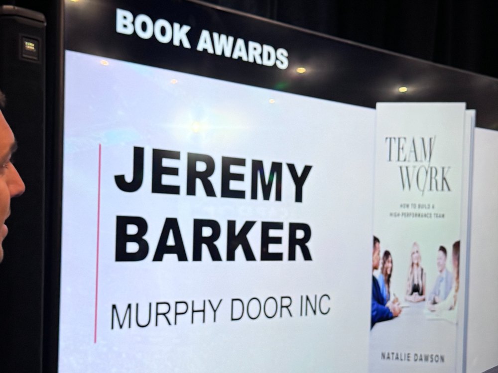 GrowthCon Book Awards screen showing Jeremy Barker, Murphy Door Inc.