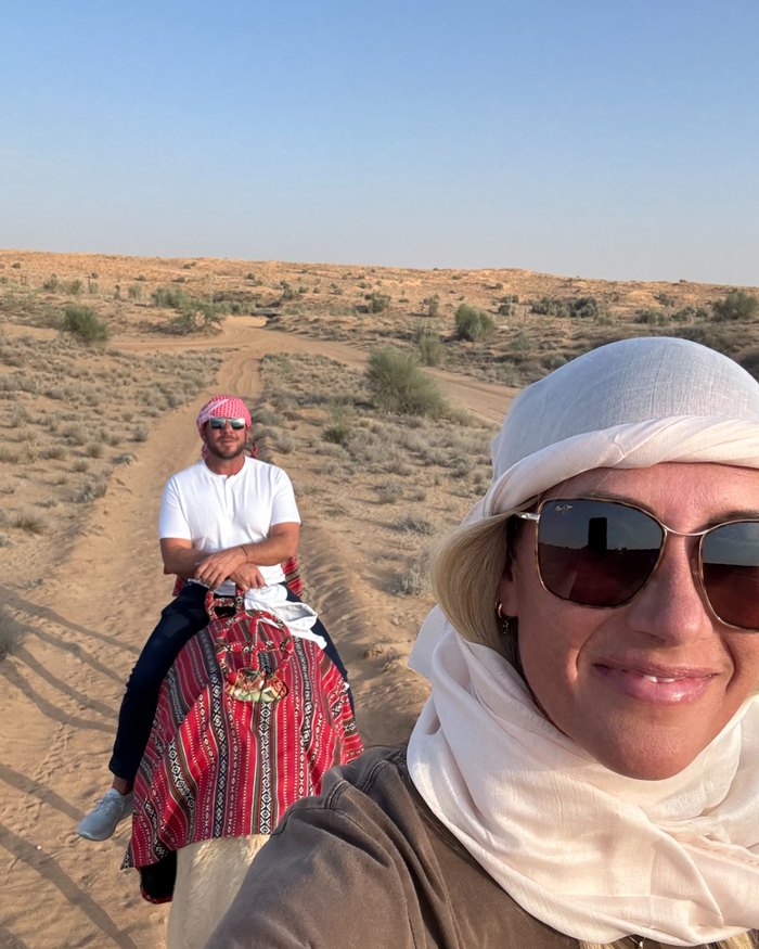 Jeremy on a camel in the desert