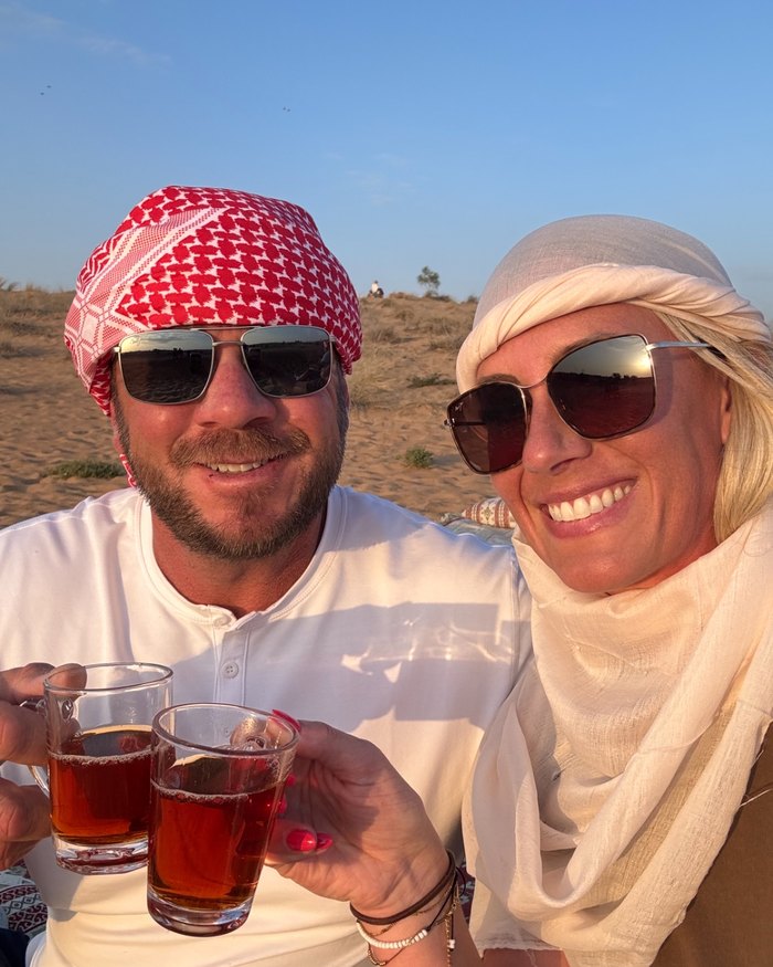 Jeremy and his wife sharing tea in the desert