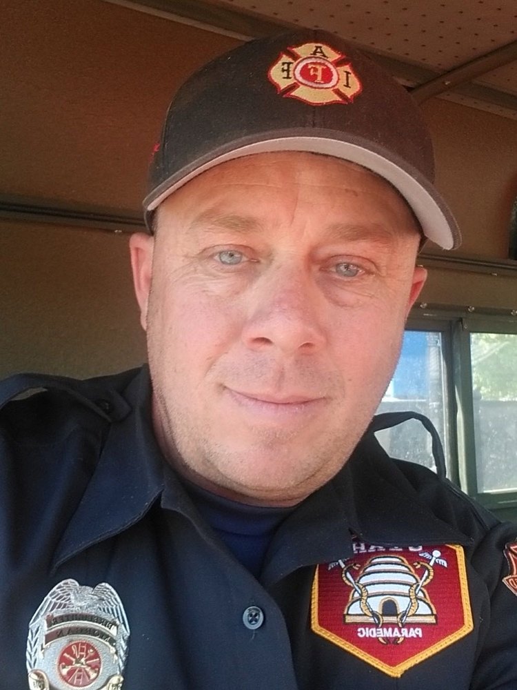Jeremy Barker in firefighter and paramedic uniform, Utah