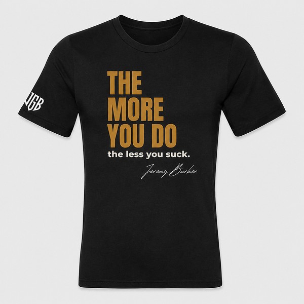 Quoted T by Jeremy Barker reading The More You Do, the Less You Suck. Entrepreneur streetwear mindset tee on a premium BYLT blank, $50.