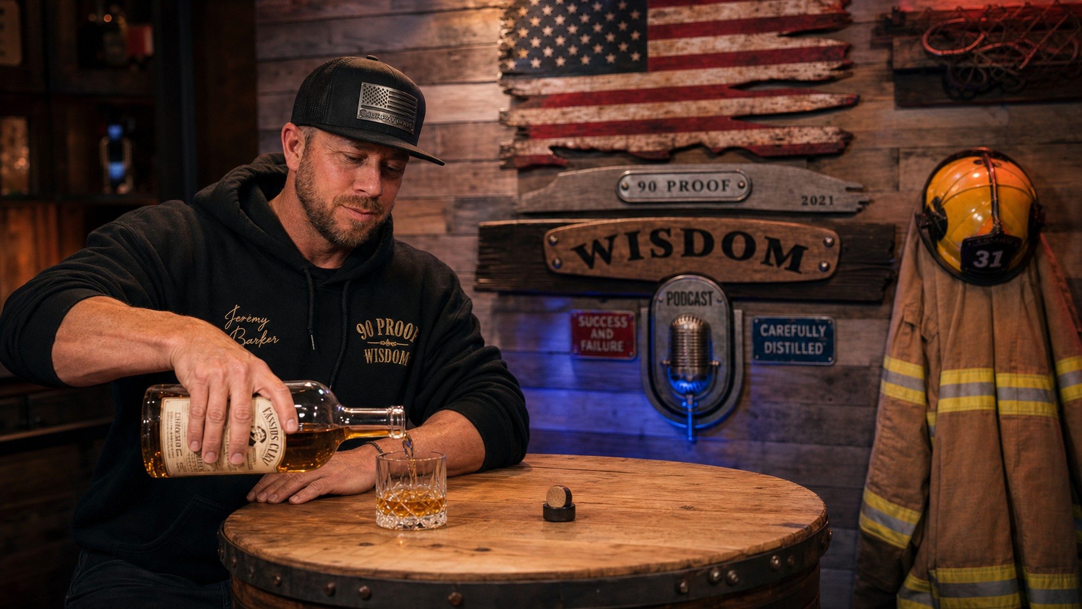 Jeremy wearing the Bourbon Black Hoodie at the bar cart